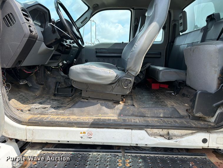 image for item YA3709 2015 Ford F650 Super Duty Ext. Cab chipper truck