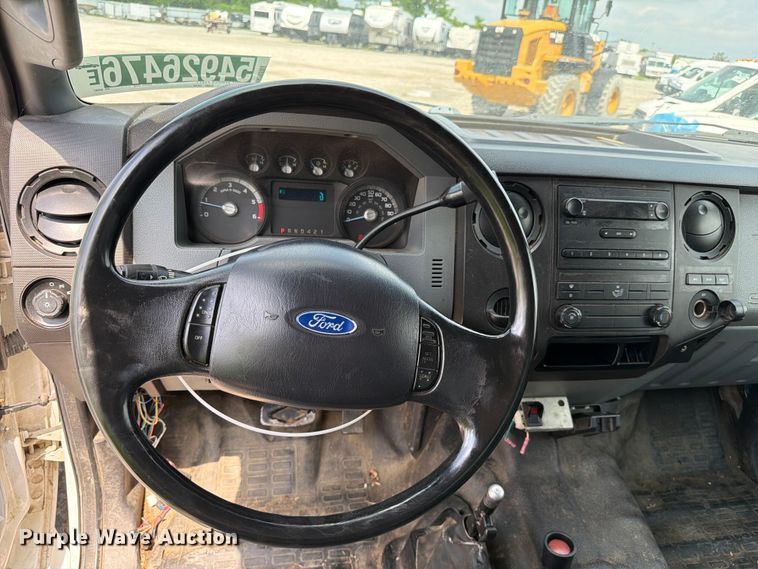 image for item YA3709 2015 Ford F650 Super Duty Ext. Cab chipper truck