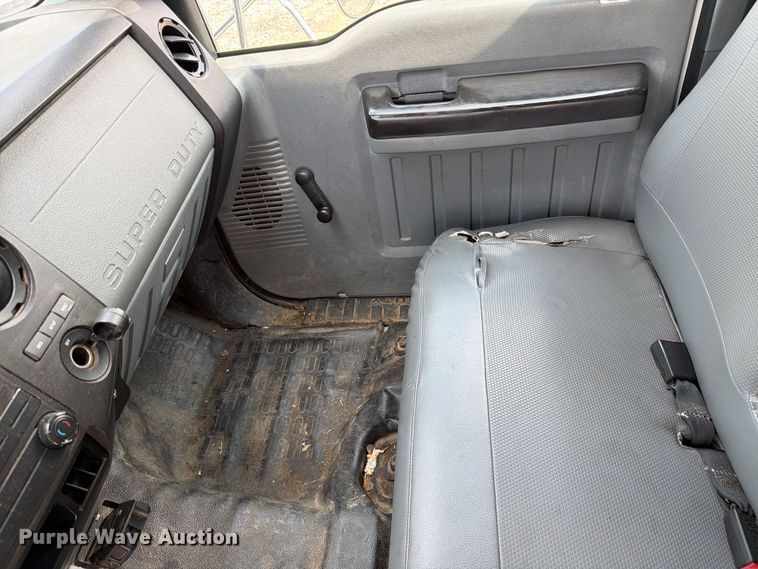 image for item YA3709 2015 Ford F650 Super Duty Ext. Cab chipper truck
