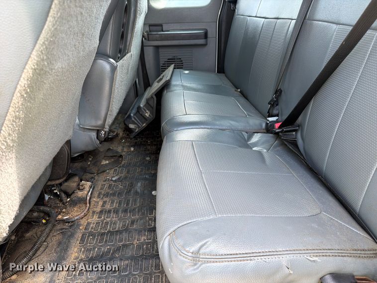 image for item YA3709 2015 Ford F650 Super Duty Ext. Cab chipper truck