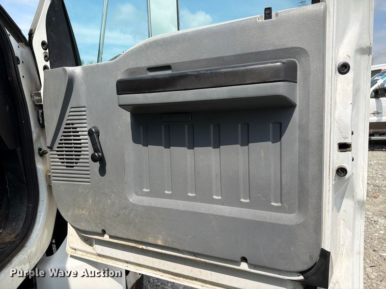 image for item YA3709 2015 Ford F650 Super Duty Ext. Cab chipper truck