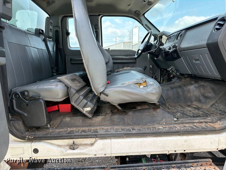 image for item YA3709 2015 Ford F650 Super Duty Ext. Cab chipper truck