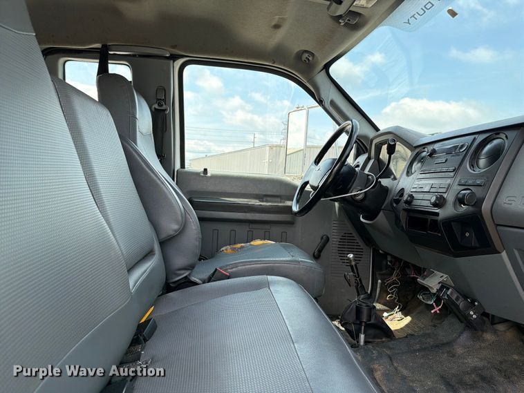 image for item YA3709 2015 Ford F650 Super Duty Ext. Cab chipper truck