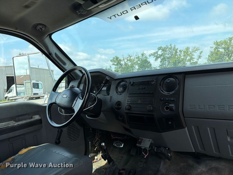 image for item YA3709 2015 Ford F650 Super Duty Ext. Cab chipper truck