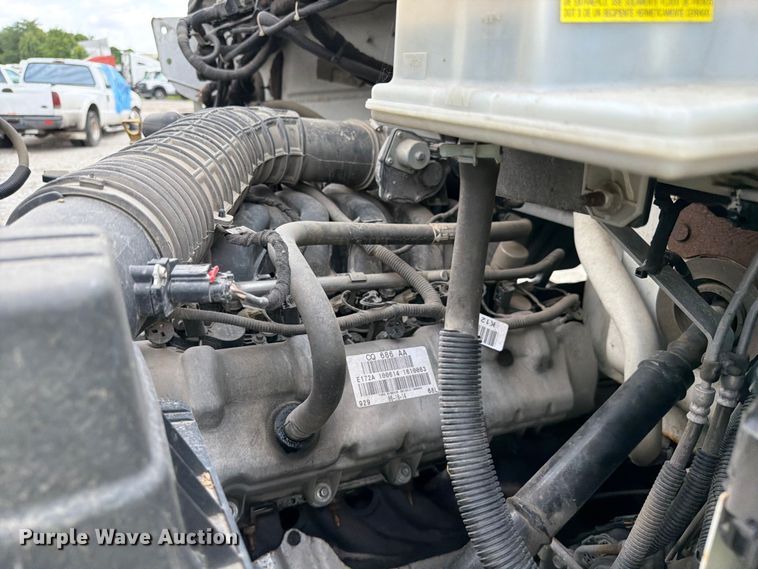 image for item YA3709 2015 Ford F650 Super Duty Ext. Cab chipper truck