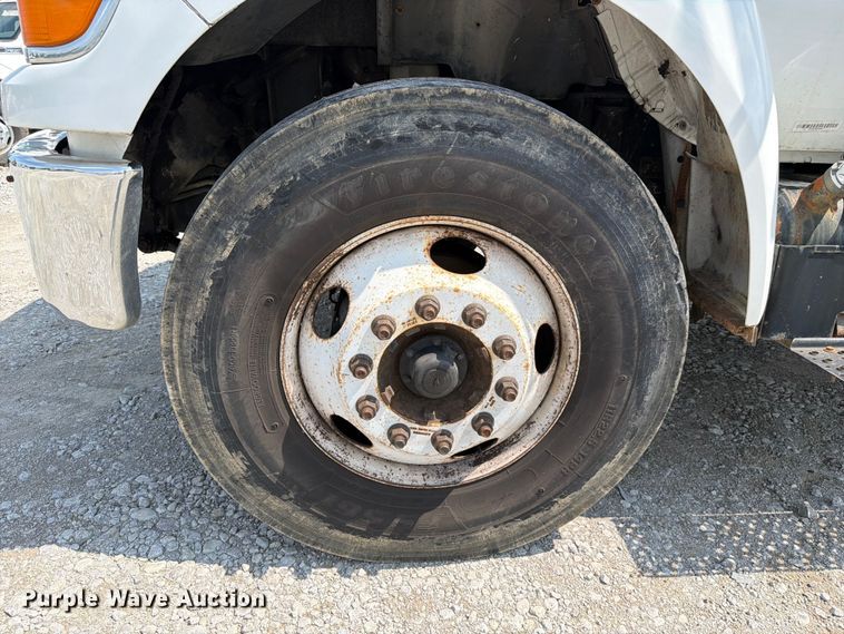 image for item YA3709 2015 Ford F650 Super Duty Ext. Cab chipper truck