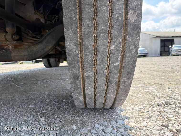 image for item YA3709 2015 Ford F650 Super Duty Ext. Cab chipper truck