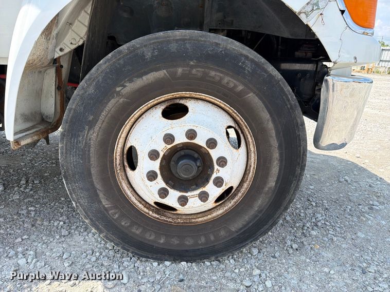 image for item YA3709 2015 Ford F650 Super Duty Ext. Cab chipper truck