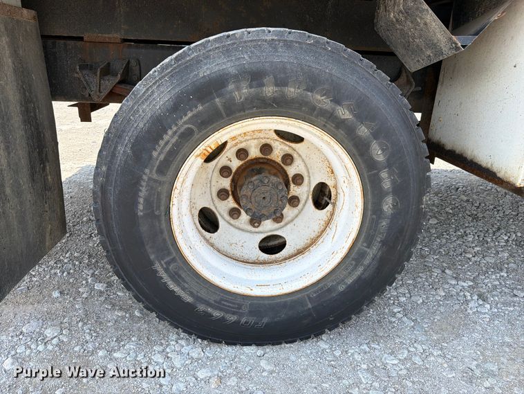 image for item YA3709 2015 Ford F650 Super Duty Ext. Cab chipper truck