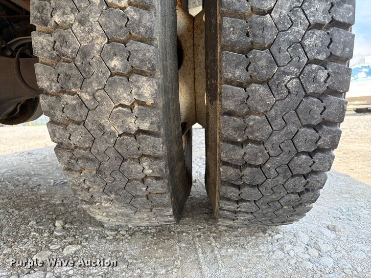 image for item YA3709 2015 Ford F650 Super Duty Ext. Cab chipper truck