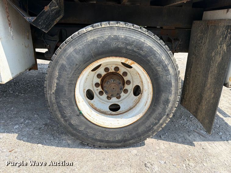 image for item YA3709 2015 Ford F650 Super Duty Ext. Cab chipper truck