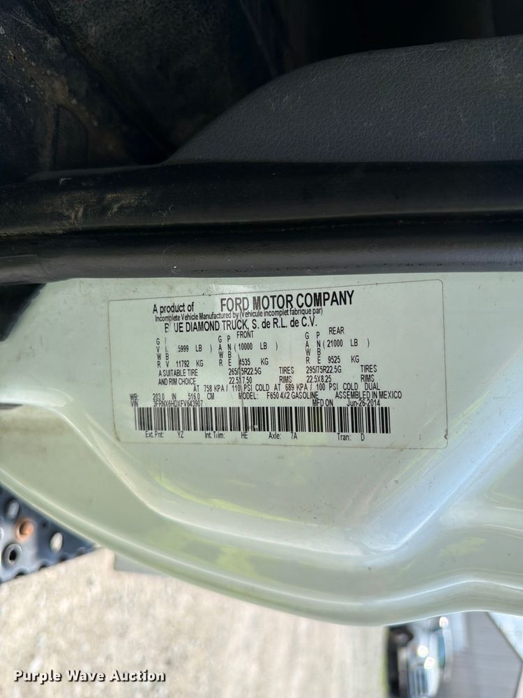 image for item YA3709 2015 Ford F650 Super Duty Ext. Cab chipper truck