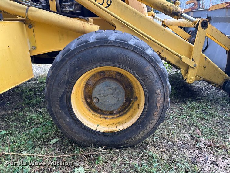 image for item ER3175 2001 New Holland LB90 backhoe