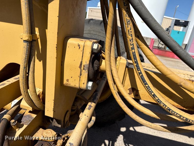 image for item EW4042 1999 Caterpillar 140H motor grader