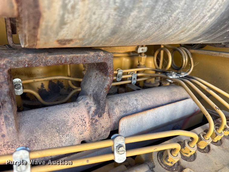image for item EW4042 1999 Caterpillar 140H motor grader