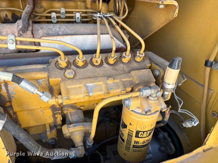 image for item EW4042 1999 Caterpillar 140H motor grader
