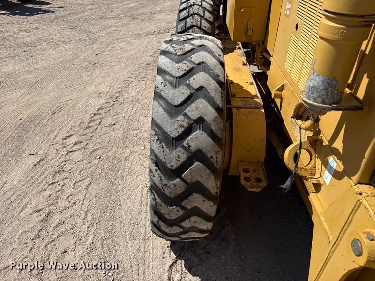 image for item EW4042 1999 Caterpillar 140H motor grader