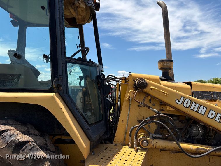 image for item EX0010 1994 John Deere 310D backhoe
