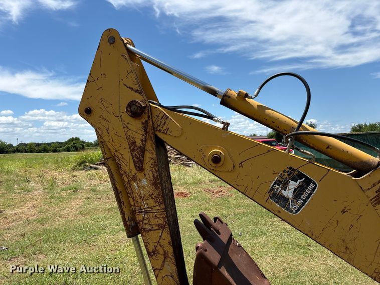 image for item EX0010 1994 John Deere 310D backhoe