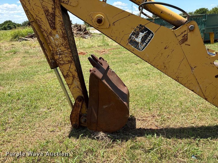 image for item EX0010 1994 John Deere 310D backhoe