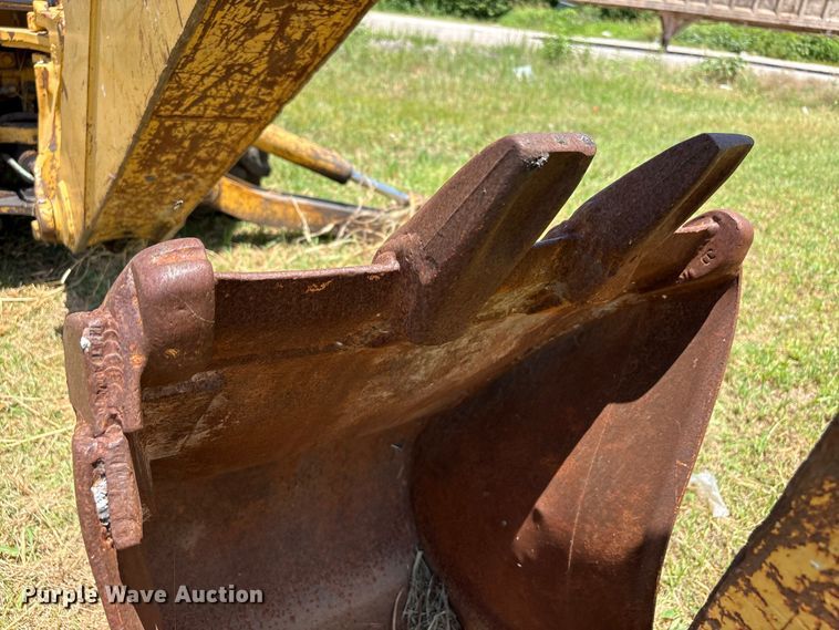 image for item EX0010 1994 John Deere 310D backhoe