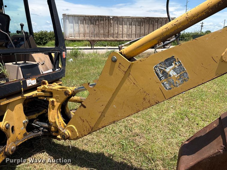 image for item EX0010 1994 John Deere 310D backhoe