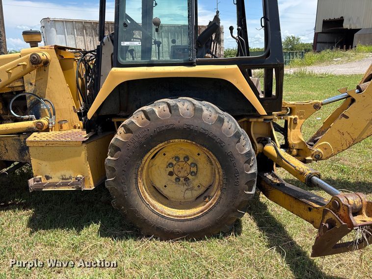 image for item EX0010 1994 John Deere 310D backhoe