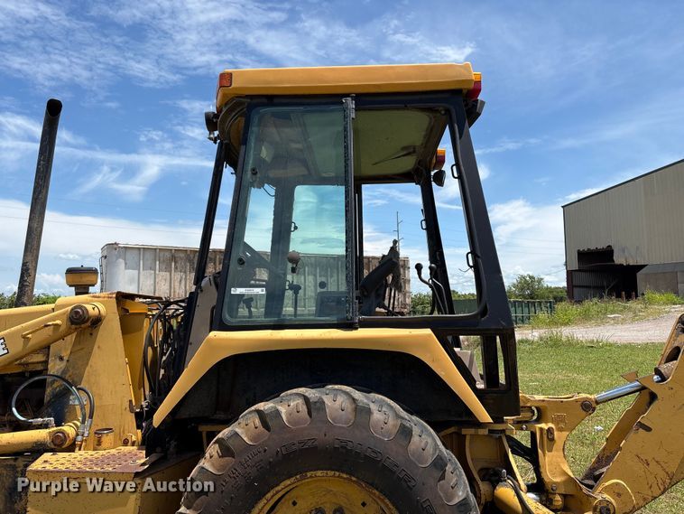 image for item EX0010 1994 John Deere 310D backhoe
