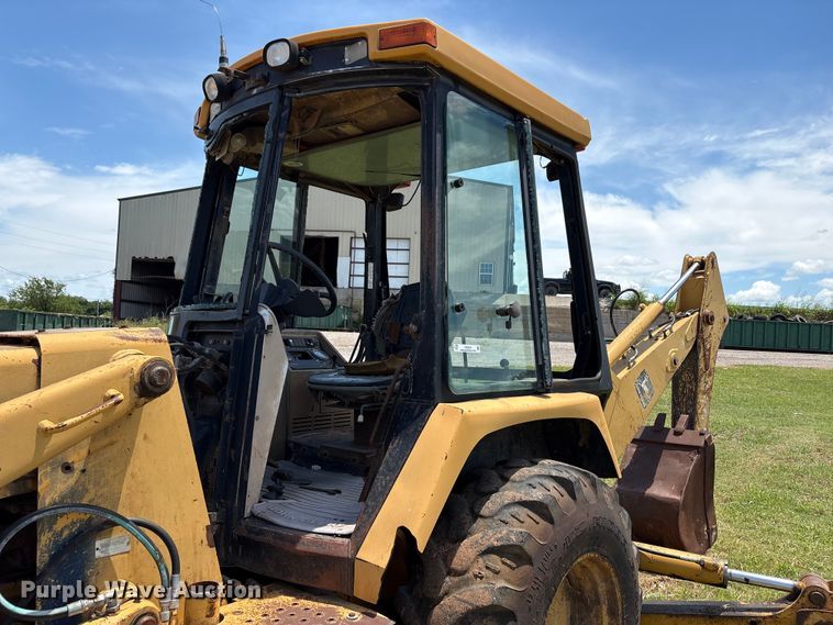 image for item EX0010 1994 John Deere 310D backhoe