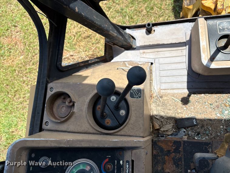 image for item EX0010 1994 John Deere 310D backhoe