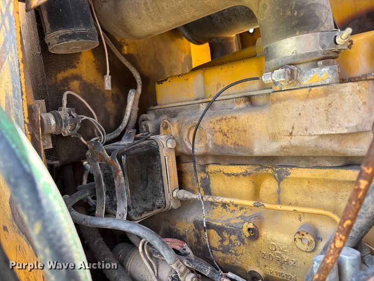 image for item EX0010 1994 John Deere 310D backhoe