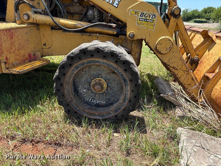 image for item EX0010 1994 John Deere 310D backhoe