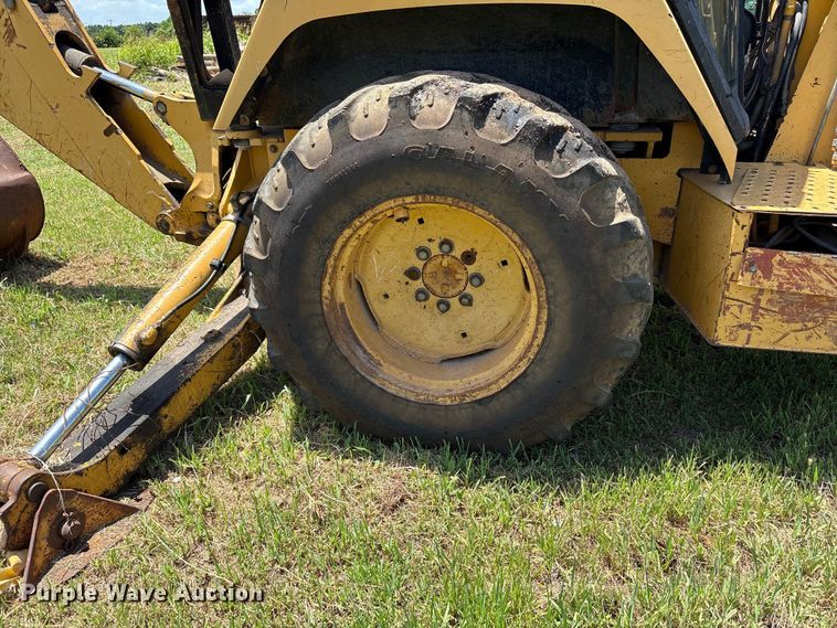 image for item EX0010 1994 John Deere 310D backhoe