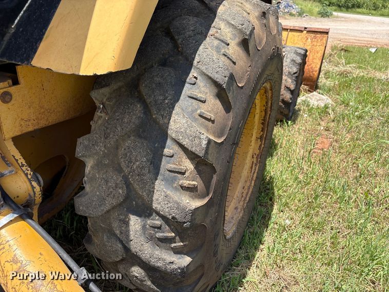 image for item EX0010 1994 John Deere 310D backhoe