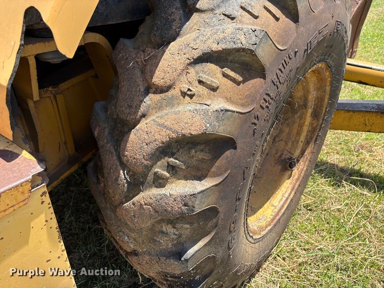 image for item EX0010 1994 John Deere 310D backhoe