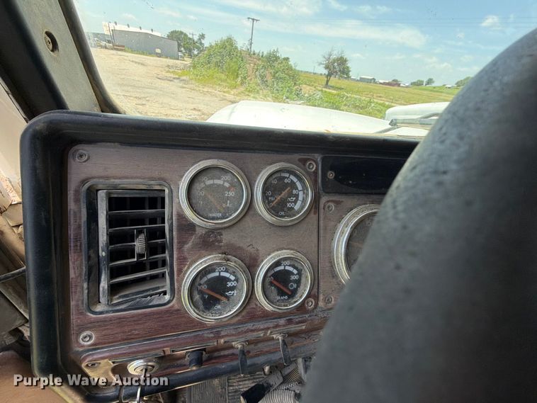 image for item EX2509 1999 Freightliner FLD120 dump truck