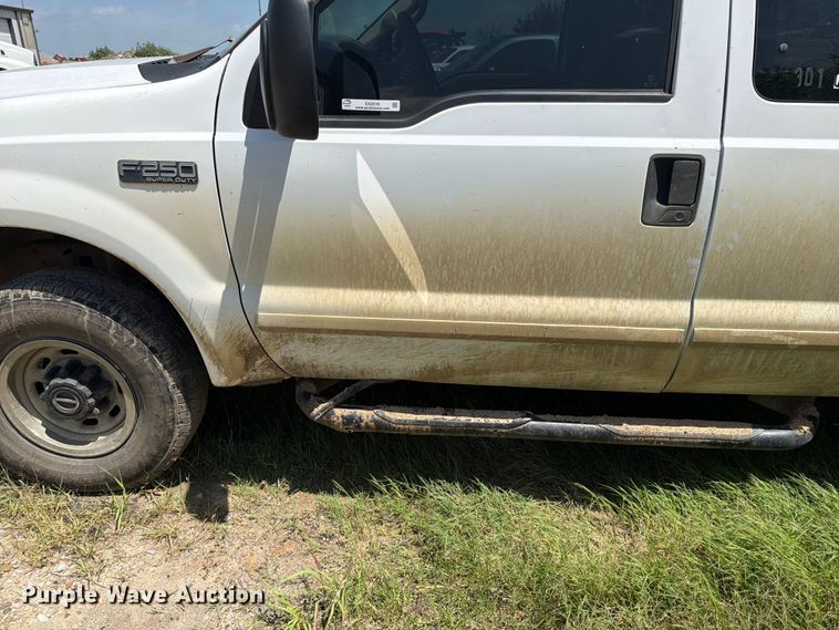image for item EX2510 2001 Ford F250 Super Duty XL Ext. Cab utility bed pickup truck