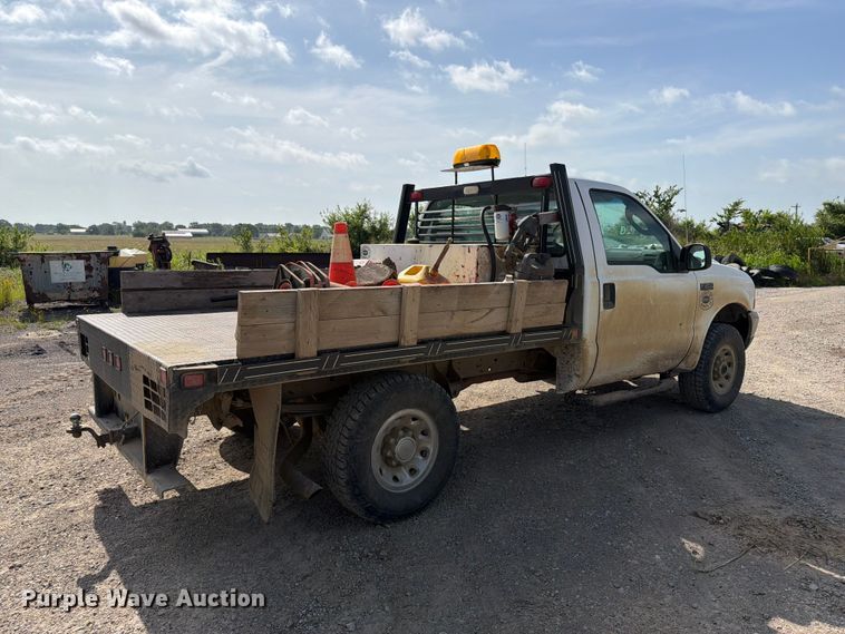 image for item EX2514 2004 Ford F250 Super Duty flatbed pickup truck