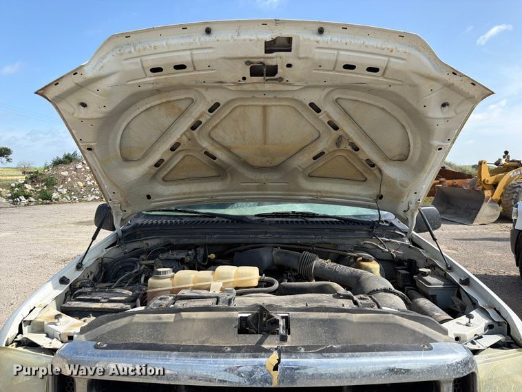 image for item EX2514 2004 Ford F250 Super Duty flatbed pickup truck