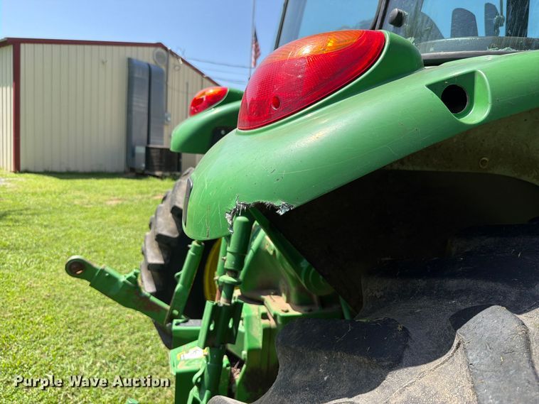 image for item FK5026 2010 John Deere 6115D MFWD tractor