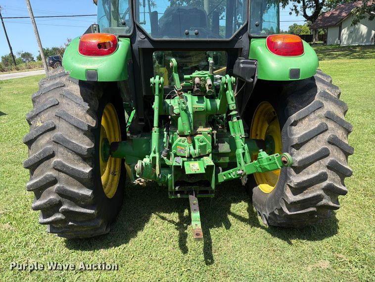 image for item FK5026 2010 John Deere 6115D MFWD tractor