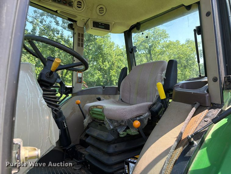 image for item FK5026 2010 John Deere 6115D MFWD tractor