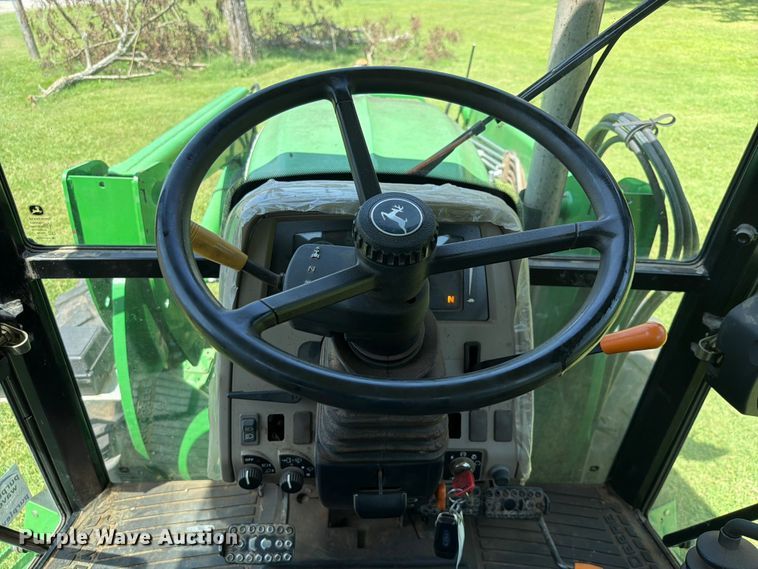 image for item FK5026 2010 John Deere 6115D MFWD tractor