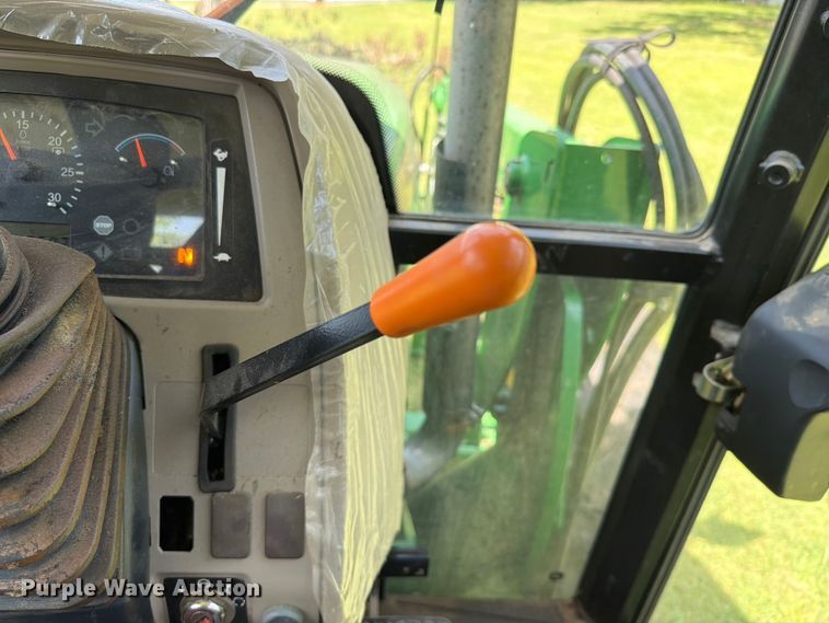 image for item FK5026 2010 John Deere 6115D MFWD tractor