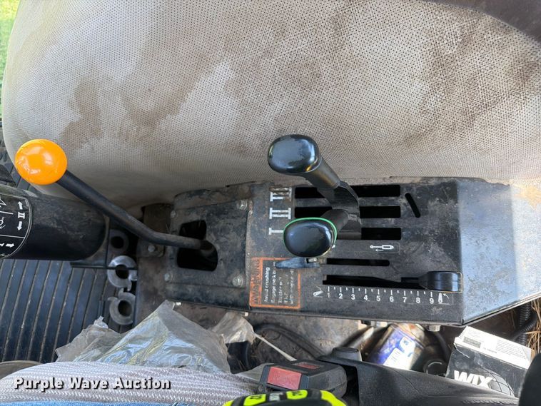 image for item FK5026 2010 John Deere 6115D MFWD tractor