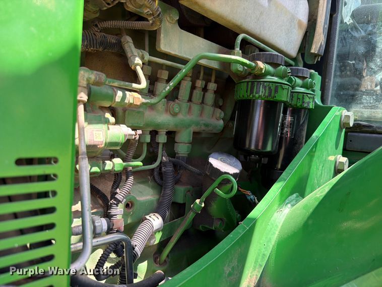 image for item FK5026 2010 John Deere 6115D MFWD tractor
