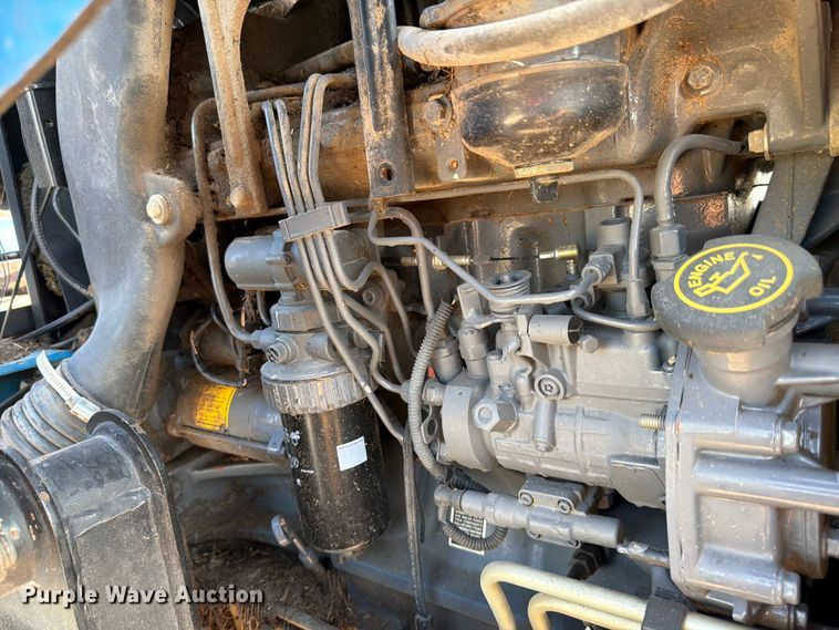 image for item EX4579 2001 New Holland TS100 MFWD tractor