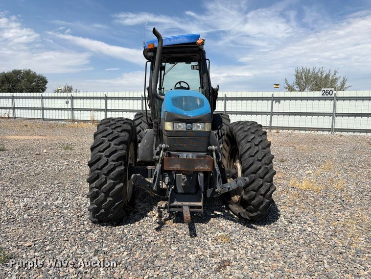 image for item YA4187 1999 New Holland TV140 MFWD bi-directional tractor
