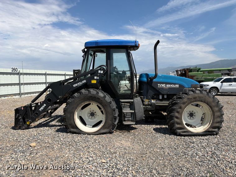 image for item YA4187 1999 New Holland TV140 MFWD bi-directional tractor