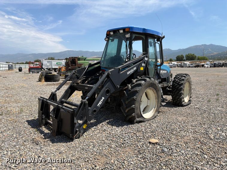 image for item YA4187 1999 New Holland TV140 MFWD bi-directional tractor
